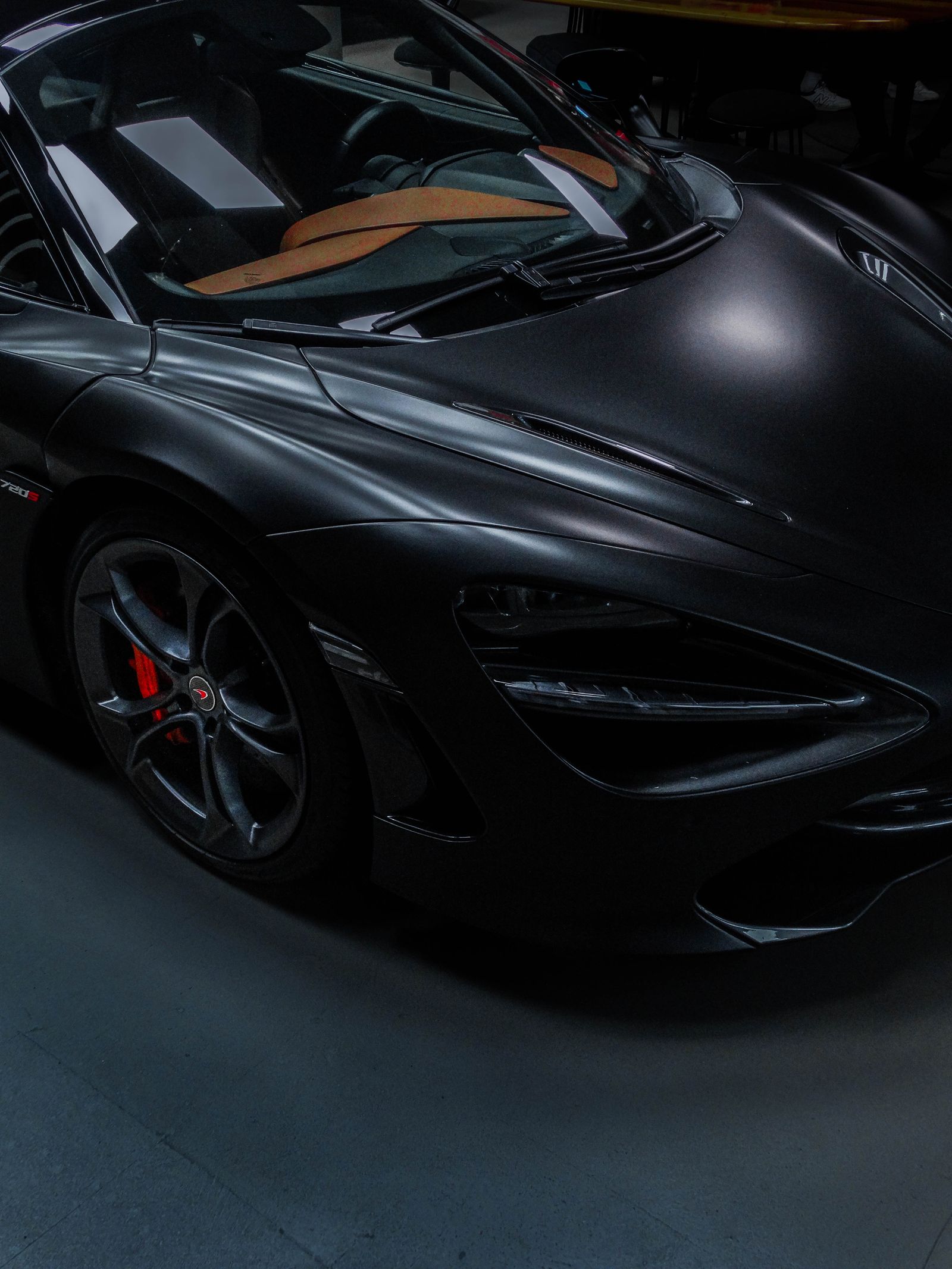 Ceramic coating photograph - black luxury sports car with deep gloss finish