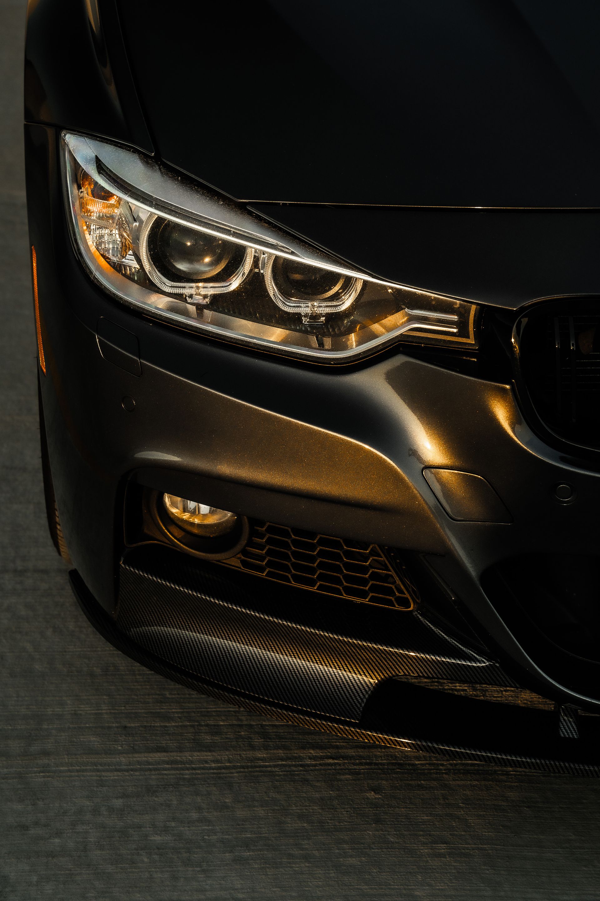 Headlight restoration photograph - close-up of a luxury car headlight